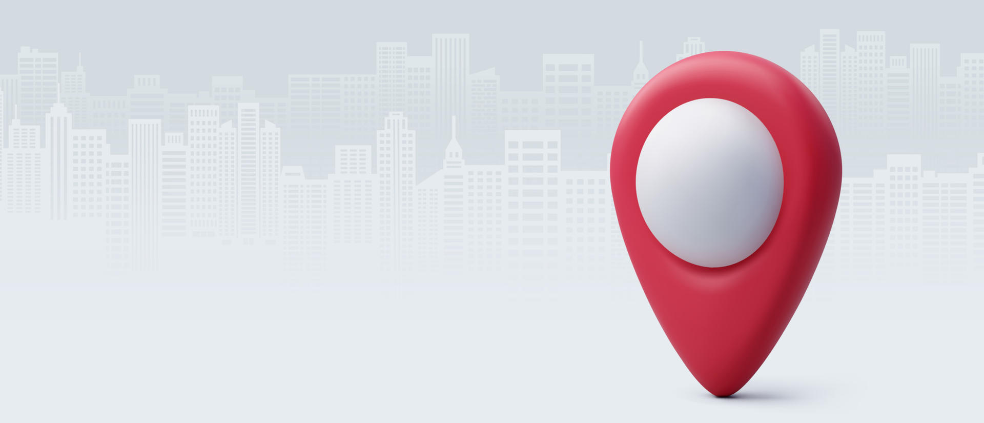 Map pin against cityscape