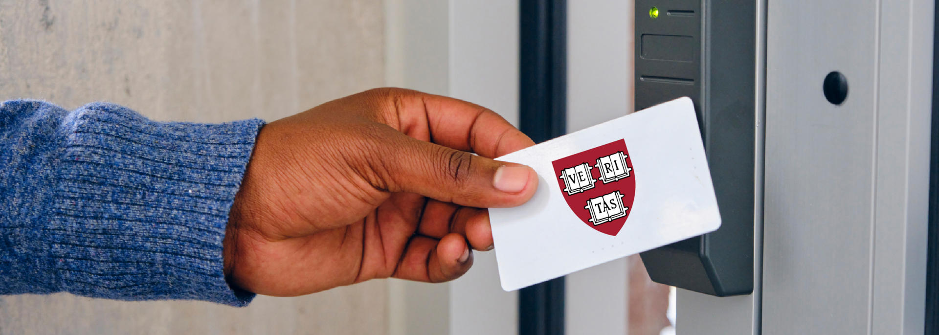 Person holding ID card